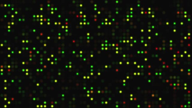 Multiple green yellow red square glowing grid pattern, perfect for scientific presentations on biological dna microarray technology and research projects.