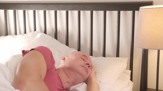 senior man rests deeply, eyes closed and face serene, Nighttime struggles, sleep disruption, anxiety in older adult, quiet moment true rest, reminding healing begins body finally surrenders to sleep