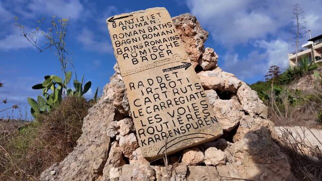 Xemxija, Malta 29.07.2026 - Heritage trail, way to Roman Baths Direction Sign.