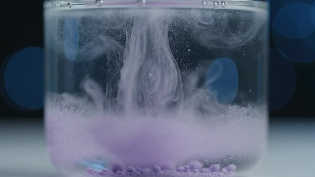 Dynamic Underwater Eruption of Purple Powder in Clear Water Creating Mesmerizing Bubble Patterns and Fluid Motion for Artistic Visual Effects and Background Use