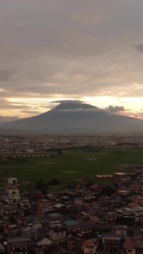 Majestic Mt. Iwaki towering over Hirosaki city cityscape