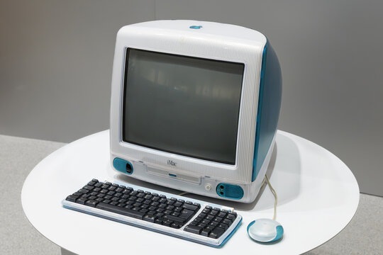 MUNICH, GERMANY - 21. April 2026: Apple Computer iMac G3 on table. Consumer product designed by Jonathan Ive and released in 1998.