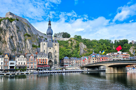 Picturesque town of Dinant, Belgium with citadel and gothic Collegiate Church of Notre Dame