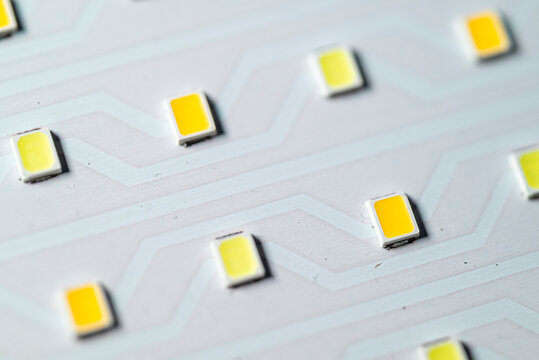 Surface mount led diodes on white circuit board The Concept of modern lighting