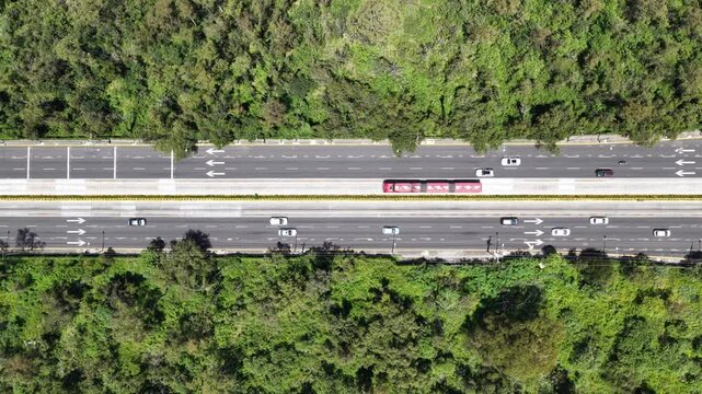 Top-Down Aerial View of Insurgentes Sur with Metrob&uacute;s and Traffic as Drone Slowly Descends, Mexico City