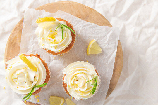 Lemon cupcakes with white frosting from top view