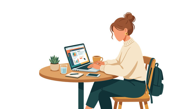 Businesswoman sitting at a cafe table while working on a laptop with a backpack placed on the chair nearby.