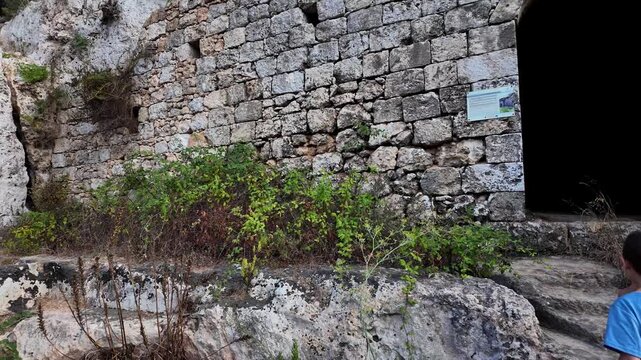 Xemxija, Malta 29.07.2026 - Xemxija Heritage trail. Detail of the exterior of ancient Roman Baths