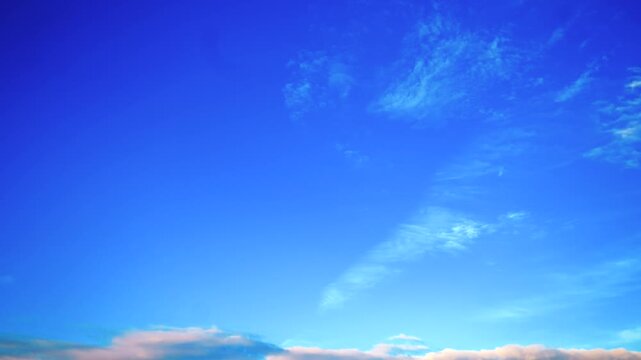 Blue Sky with Light Fluffy Clouds Moving in Timelapse Copy space for yext and graphics