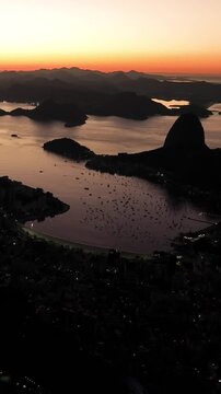 Rio de Janeiro, Corcovado Mountain. Cristo Redentor, christ the redeemer. Aerial view in sunrise. Establishing shot.
