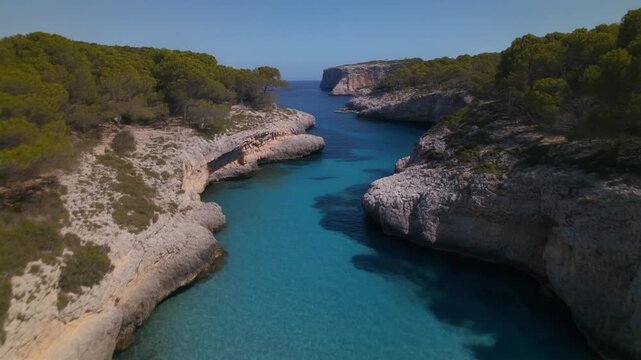 Aerial drone view of cala pi Mallorca with turquoise water and cliffs