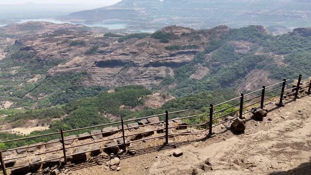 Ratangad fort cliff edge trail and railing aerial Maharashtra India