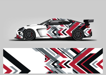 Fototapeta premium Aggressive automotive car wrap design vector template with sharp geometric speed lines in red and pink