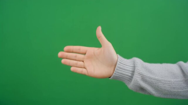 Clean human hand executing a friendly waving gesture against a green screen for website landing pages, customer service introductions, and social media welcome motion graphics overlays.