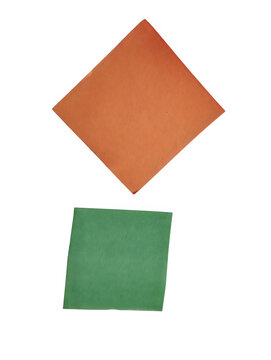 Orange diamond shape and green square shape paper pieces isolated on transparent background