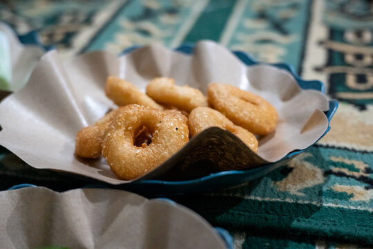 Close up of traditional Indonesian fried sweet ring snack ali agrem