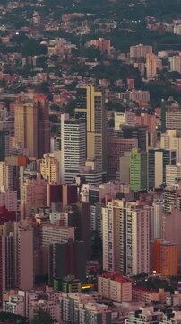 Golden hour sunset over the modern city skyline of Curitiba Parana, Parana, Brazil