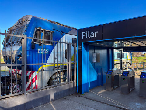 Pilar Railway Station, entrance gates and diesel train engine - Buenos Aires