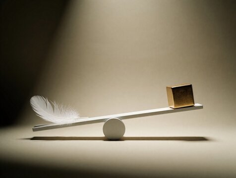 A soft feather balances against a solid gold cube on a minimalist seesaw. Contrast shown in light versus heavy on a neutral beige background with dramatic shadow. Balance and harmony concept.