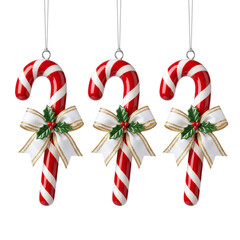 Obraz premium Three Christmas candy canes with white bows and holly