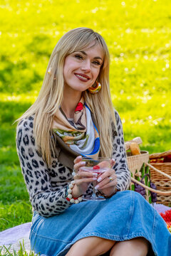 Fall in Style: A European Model's Picturesque Picnic Amidst Autumn's Golden Splendor