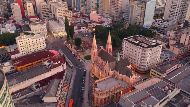 Sun setting behind the modern skyline of Curitiba Parana Brazil, Parana, Brazil