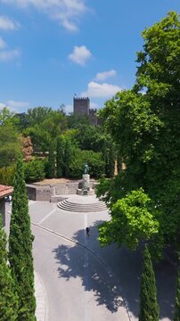 Guimaraes, Portugal - July 19, 2026: Pull Out Shot of Castelo de