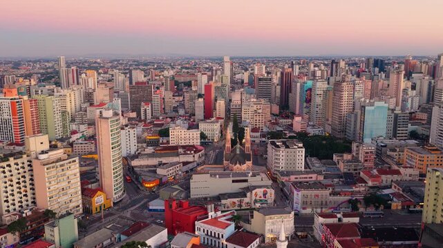 Vibrant sunset sky over the urban skyline of Curitiba Parana, Parana, Brazil