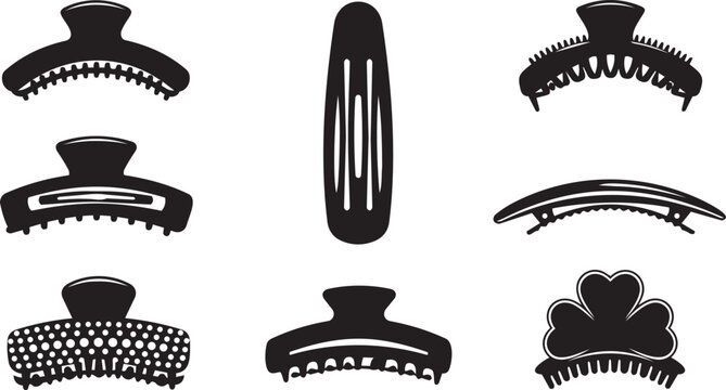 Assortment of black hair clips and barrettes on a white background