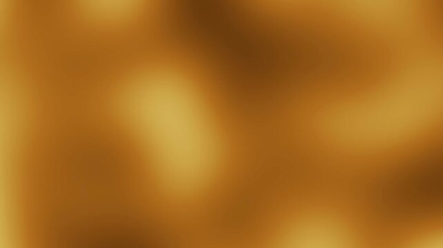 Abstract golden brown blurred background with soft light gradients, perfect for creative design and visual projects