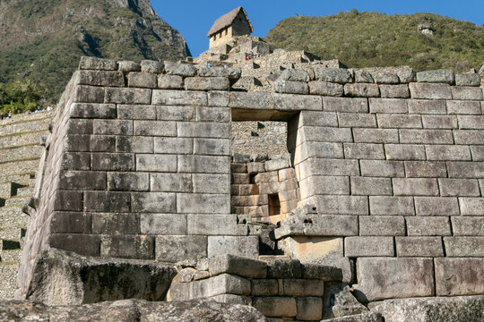 Ancient Inca stone architecture and trapezoidal doorway at Machu Picchu, Peru