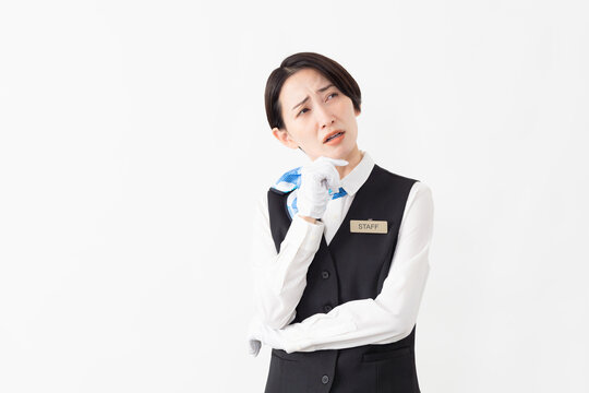 制服を着たアテンダントの女性　旅行イメージ