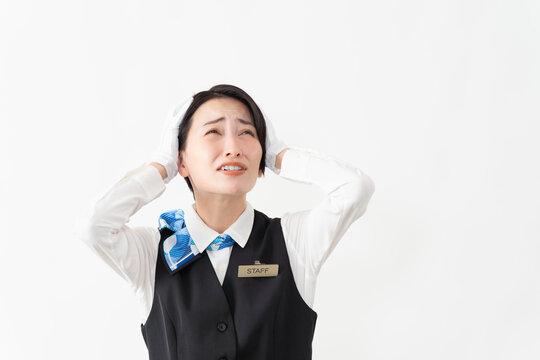 制服を着たアテンダントの女性　旅行イメージ