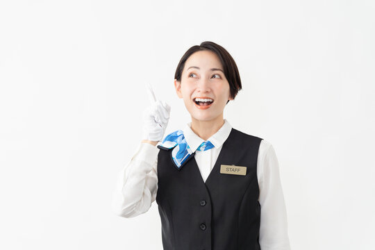 制服を着たアテンダントの女性　旅行イメージ