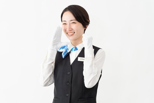 制服を着たアテンダントの女性　旅行イメージ