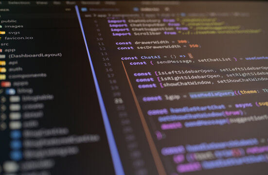 Close-up of source code in a modern code editor highlighting AI chatbot development, software engineering, programming workflow, web application architecture, coding, automation..