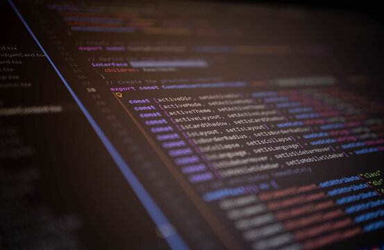 Close-up of source code displayed in a modern code editor, representing software development, programming, coding workflow, application architecture, debugging, web technology.