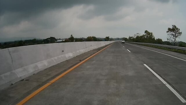 Rear Dashcam Driving on Purwodadi Pasuruan Toll Road Toward Malang During a Clear Morning in East Java, Indonesia