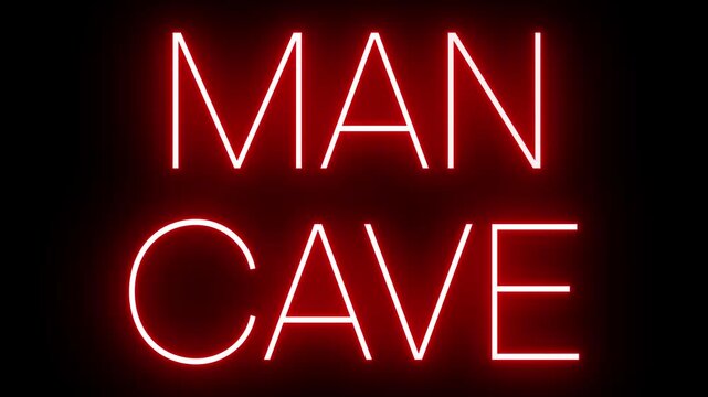 Red Neon MAN CAVE Sign Flickering on Black Background