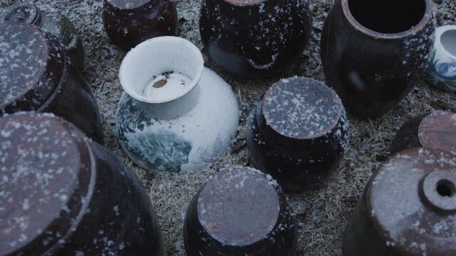 Snow Falls on Korean Ceramic Pots