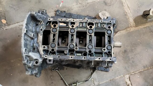 Disassembled Car Engine Block During Automotive Repair and Engine Overhaul Process