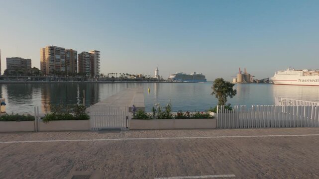 Tranquil port harbor view with pier and cruise ship in Malaga Spain