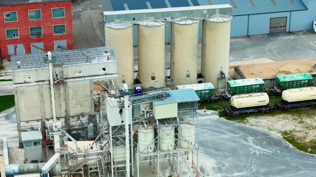 Drone view of asphalt production silos drying system and aggregate storage yard
