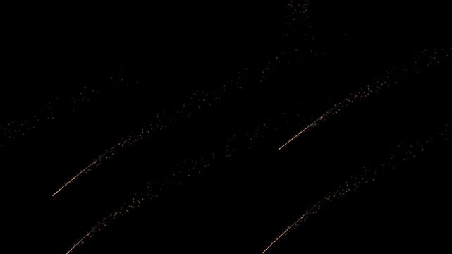 shooting star streaks across the sky.Meteor falling on black. particle 4k movie.