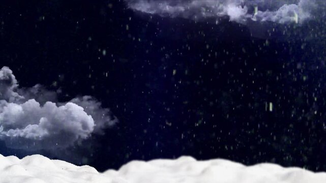Heavy snow falling over dark night sky above white snow covered ground winter weather atmosphere with rolling clouds background
