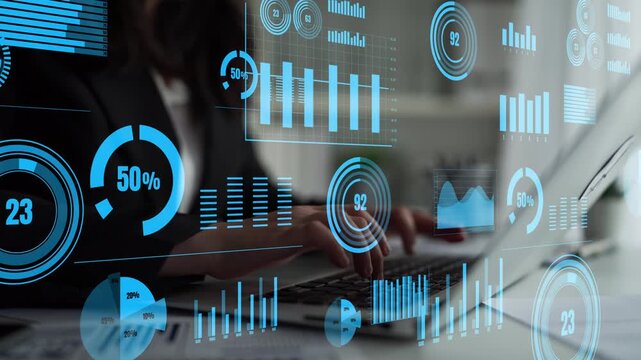 A business professional interacts with a laptop surrounded by futuristic data visuals, conducting in-depth analysis to drive strategic decisions in a modern workspace. Xenic