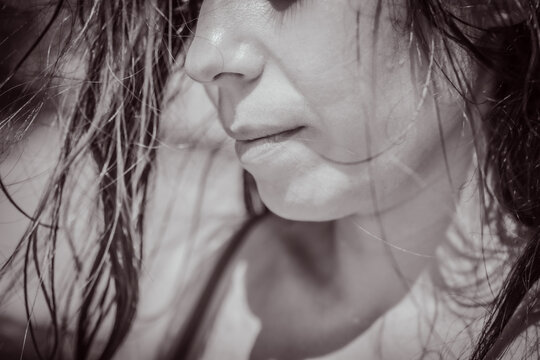 Woman&rsquo;s face, sepia tone