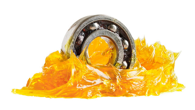 Grease and ball bearing on white.