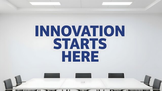 Modern office conference room with innovation starts here text on wall