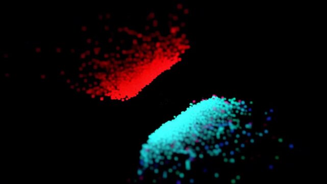 Abstract explosion of red and blue particles against a black background.
